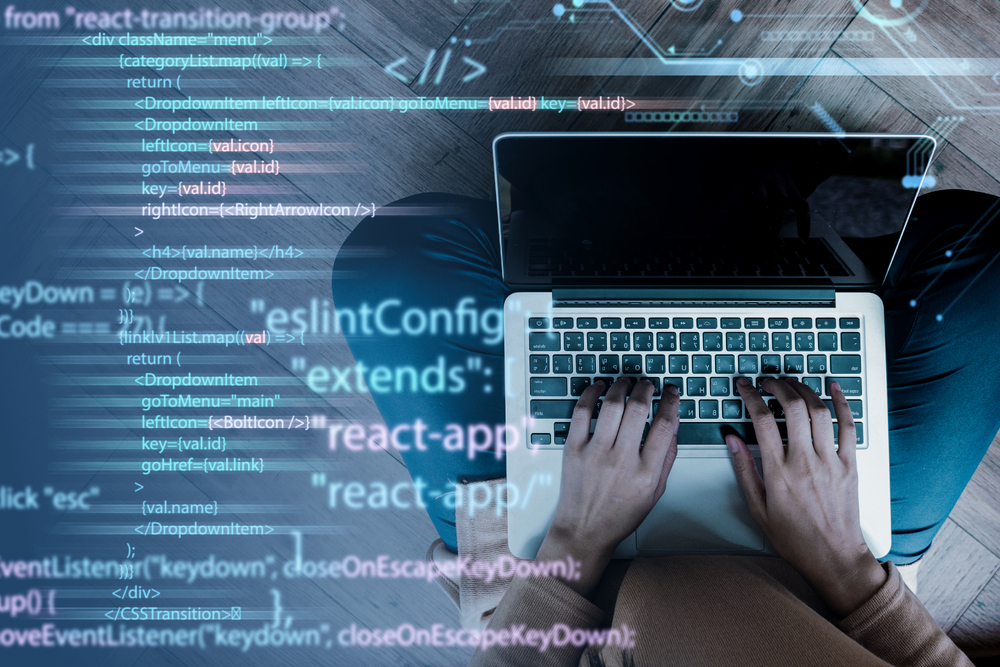 programming-background-with-person-working-with-codes-computer-4-1